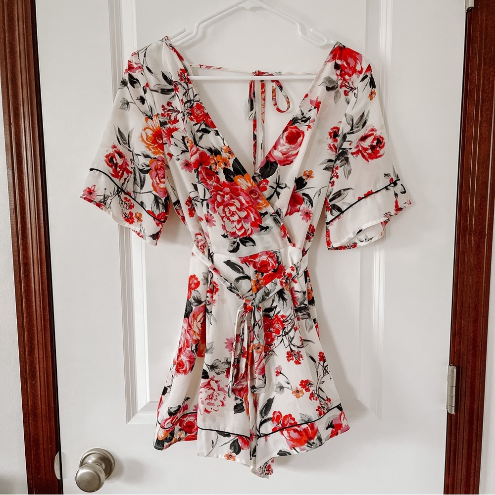 Francesca’s Wrap-Front Low Zipper-Back Floral Romper